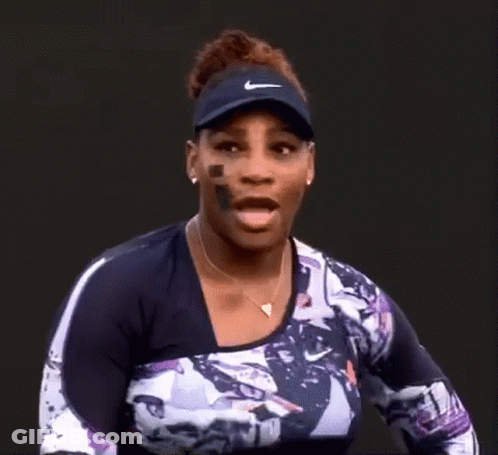 Woman In Nike Visor And Necklace GIF