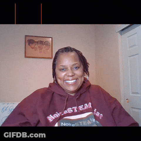 Woman In Noire Stem Hoodie Smiling GIF