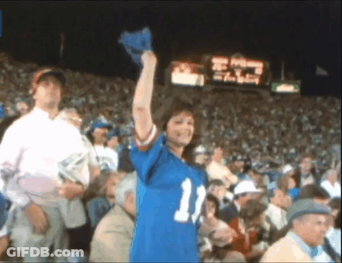 Woman In Number 11 Jersey At Football Game GIF