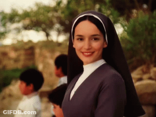 Woman In Nun's Veil Smiling GIF