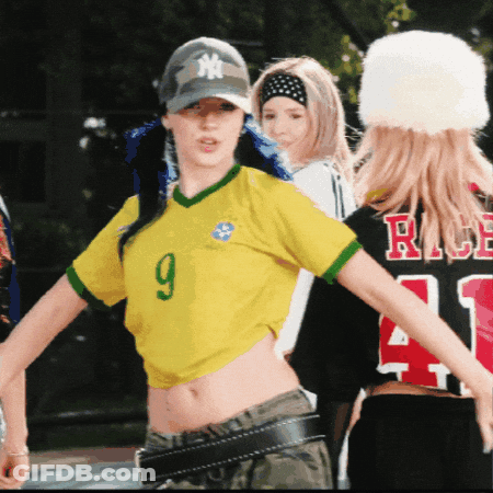 Woman In NY Hat And Yellow Shirt 9 GIF