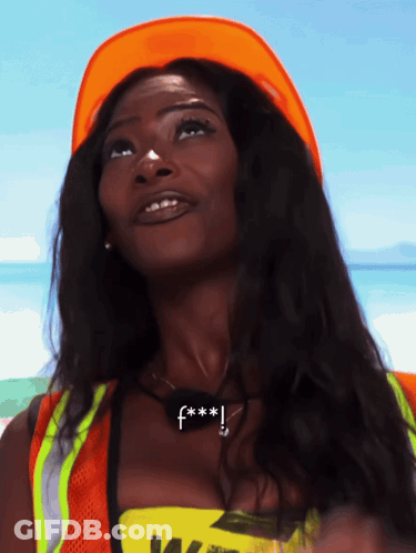 Woman In Orange Hard Hat With F *** Necklace GIF