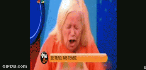 Woman In Orange Shirt Crying On TV GIF