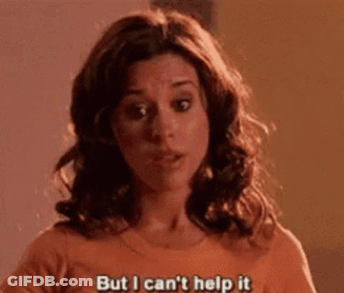 Woman In Orange Shirt Saying But I Cant Help It GIF