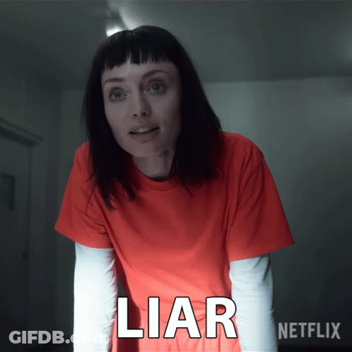 Woman In Orange Shirt Saying Liar GIF