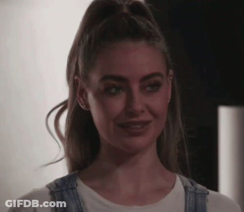 Woman In Overalls Smiling GIF