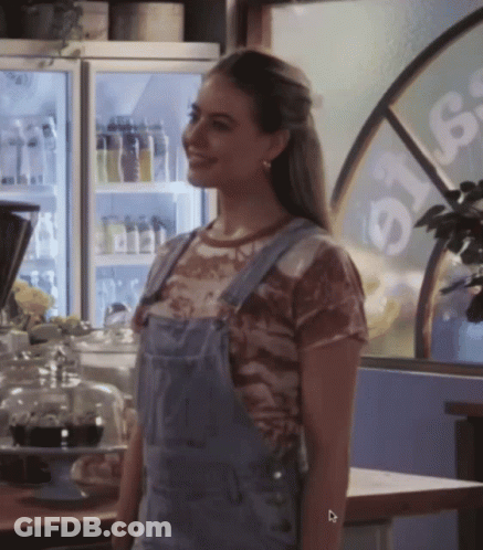 Woman In Overalls With Sign Ste GIF