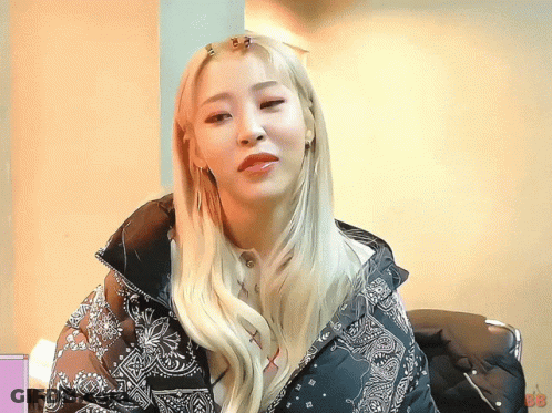 Woman In Paisley Black Jacket GIF