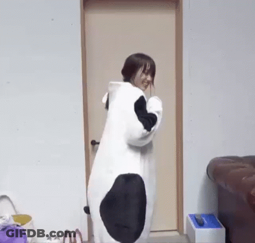 Woman In Panda Costume At Doorway GIF