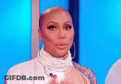 Woman In Pearl Necklace And Hoop Earrings GIF