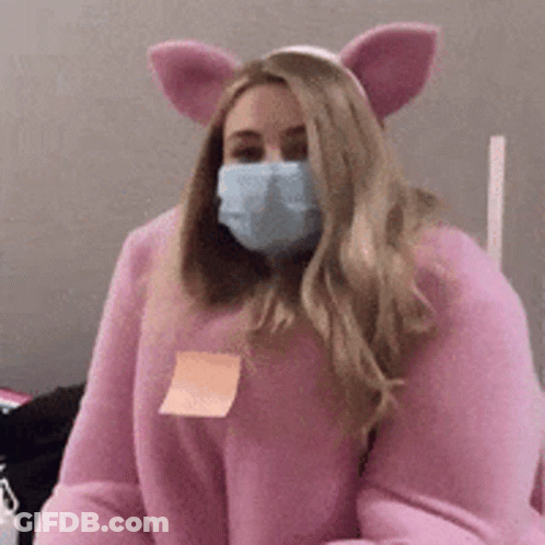 Woman In Pig Costume With Mask Holding Sticky Note GIF