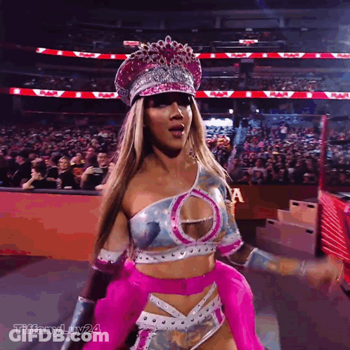 Woman In Pink And Silver Outfit With Hashtag Tiffanyluv24 GIF