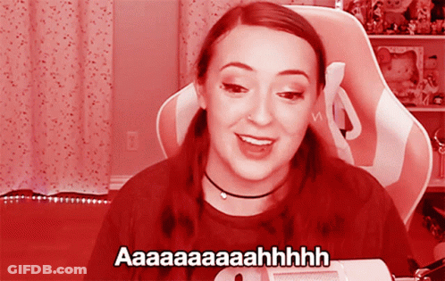 Woman In Pink And White Chair Saying Aa Aa Aahhh GIF