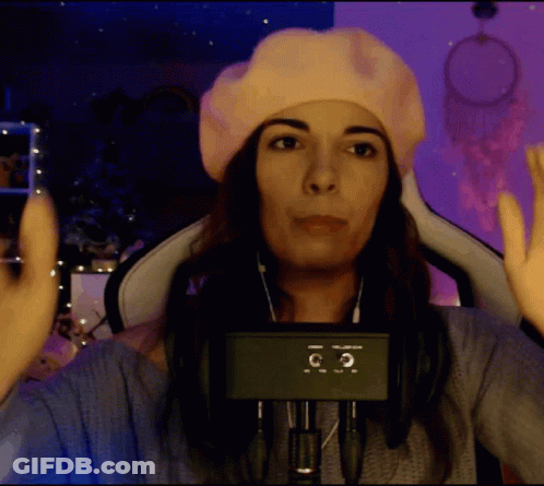 Woman In Pink Beret And Headphones At Microphone GIF