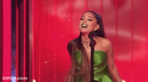 Woman In Pink Beside Woman In Blue GIF