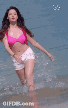Woman In Pink Bikini Running In Ocean GIF