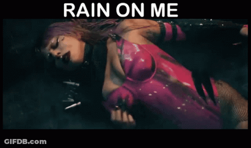 Woman In Pink Bodysuit Lying Down Rain On Me GIF