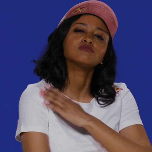 Woman In Pink Cap Continuous Shoulder Brush GIF
