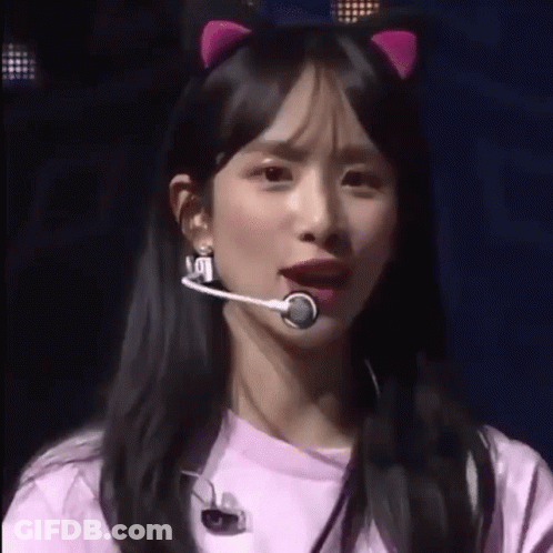 Woman In Pink Cat Ear Headband With Microphone GIF