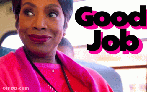 Woman In Pink Coat Smiling Good Job GIF