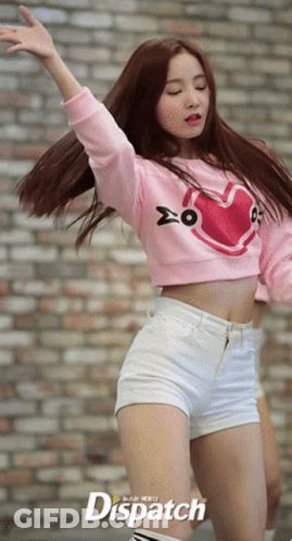 Woman In Pink Crop Top And White Shorts Dancing GIF