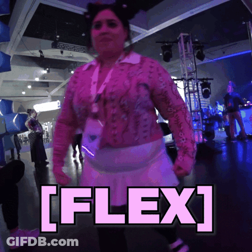 Woman In Pink Dancing With Flex Sign GIF