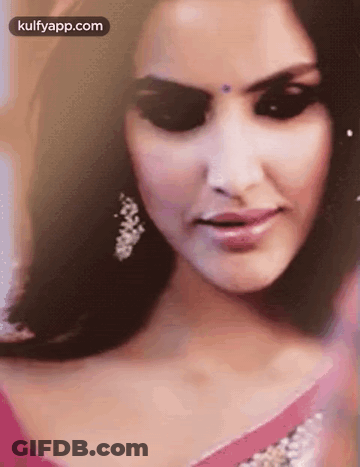 Woman In Pink Dress And Earrings GIF