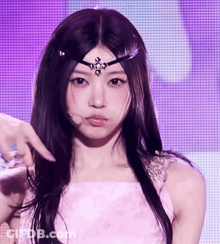 Woman In Pink Dress And Headpiece GIF