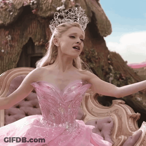 Woman In Pink Dress And Tiara Singing GIF