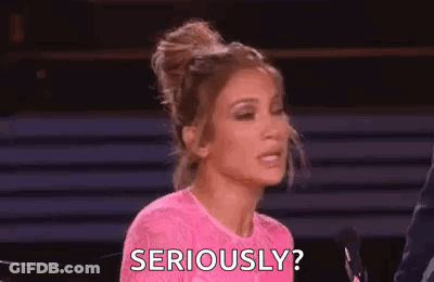 Woman In Pink Dress Asking Seriously GIF