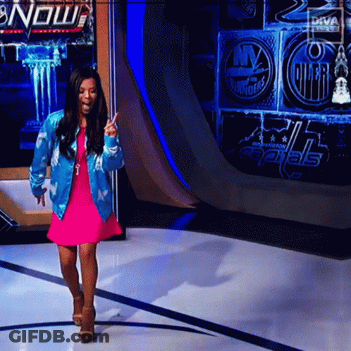 Woman In Pink Dress Blue Jacket Capitals Wall GIF