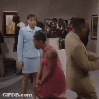 Woman In Pink Dress Dancing In Museum GIF