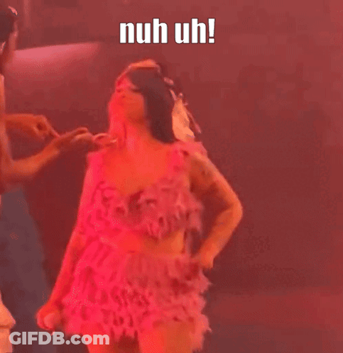 Woman In Pink Dress Dancing With Man Behind GIF