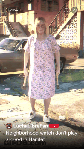 Woman In Pink Dress Holding Axes Beside Brown Car GIF