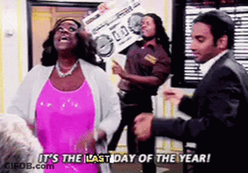 Woman In Pink Dress Holding Boombox Dancing With Two Men In Suits GIF