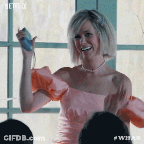 Woman In Pink Dress Holding Nintendo Wii GIF