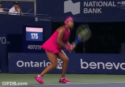 Woman In Pink Dress Holding Tennis Racquet GIF