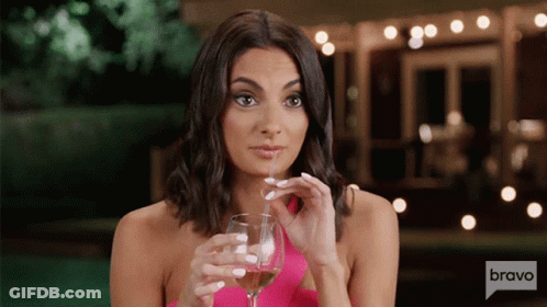 Woman In Pink Dress Holding Wine Bravo GIF