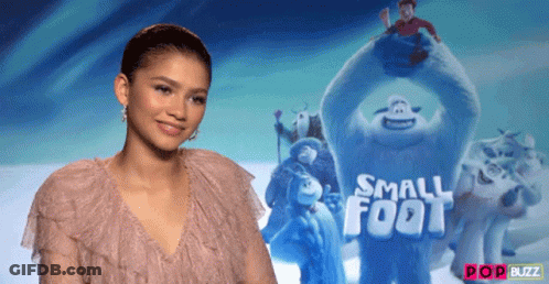 Woman In Pink Dress In Front Of Foot Poster GIF