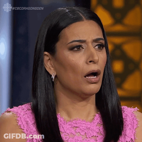 Woman In Pink Dress Making Funny Face GIF