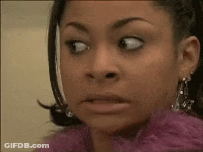 Woman In Pink Dress Making Funny Face GIF
