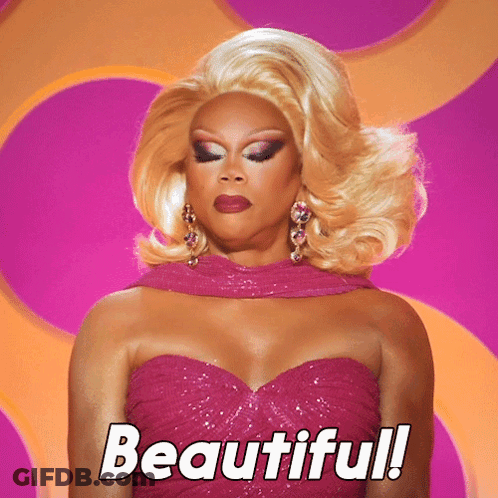 Woman In Pink Dress Saying Beautiful GIF