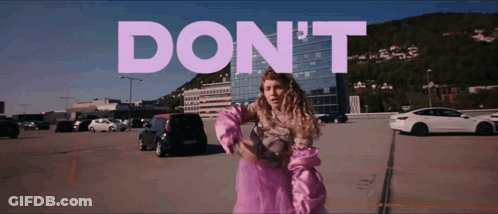 Woman In Pink Dress Saying Don't GIF