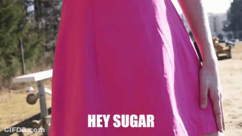 Woman In Pink Dress Saying Hey Sugar GIF