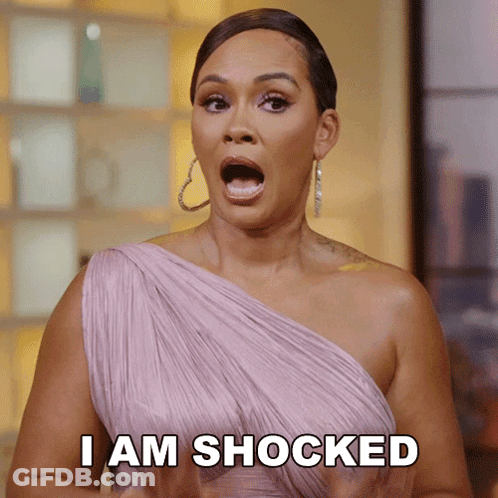 Woman In Pink Dress Saying I Am Shocked GIF