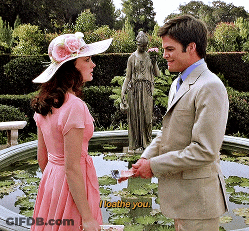 Woman In Pink Dress Saying I Loathe You GIF