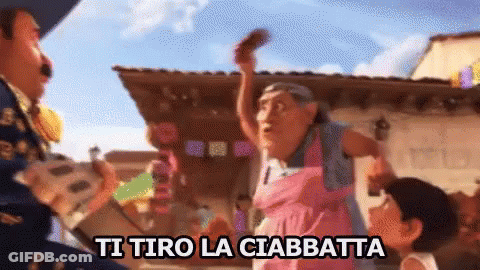 Woman In Pink Dress Says Ti Tiro La Ciabatta GIF
