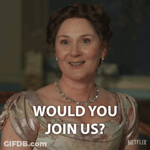 Woman In Pink Dress Smiling Says Would You Join Us GIF