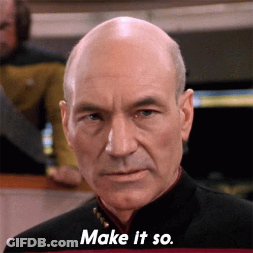 Woman In Pink Dress Standing In Front Of Mirror Made With Reface App GIF