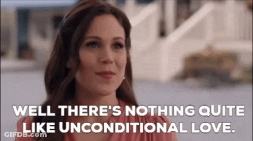 Woman In Pink Dress Talking About Unconditional Love GIF